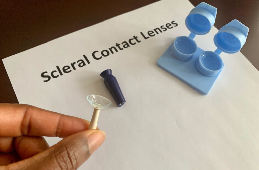 A contact lens case with scleral contacts and a contact lens insertion and removal kit